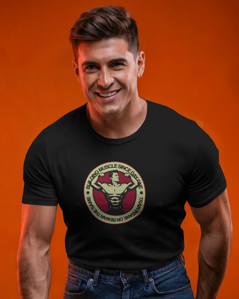 "Building Muscle Since Day One" Vintage Bodybuilding T-Shirt - Retro Fitness Badge Tee