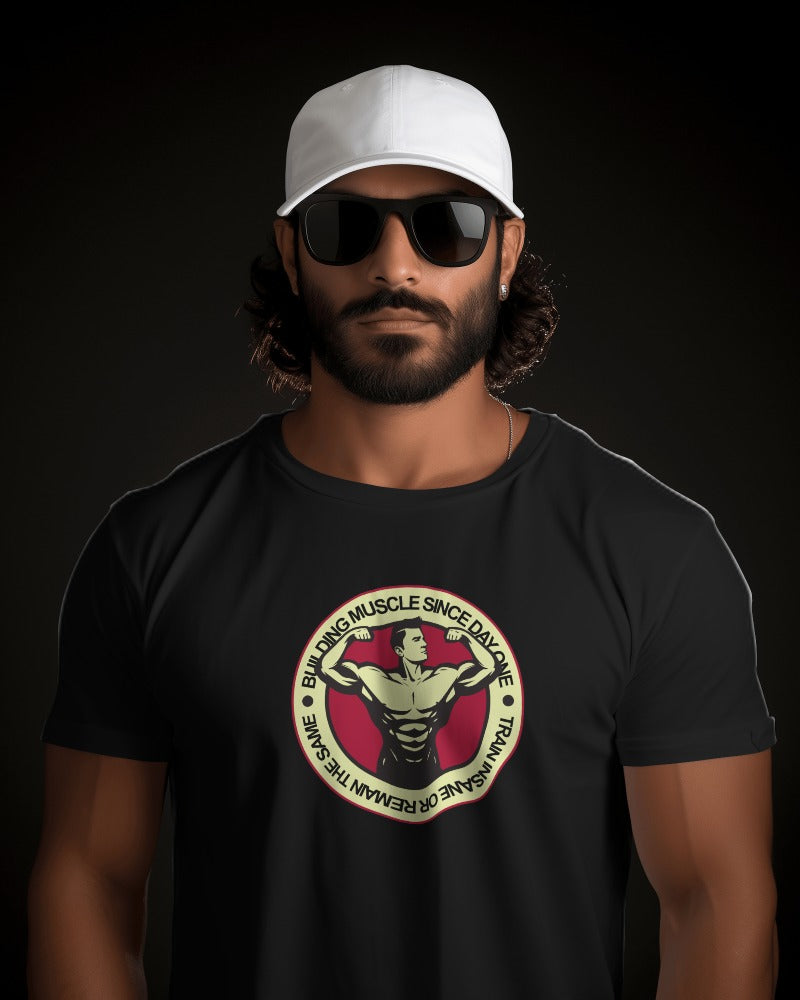 "Building Muscle Since Day One" Vintage Bodybuilding T-Shirt - Retro Fitness Badge Tee