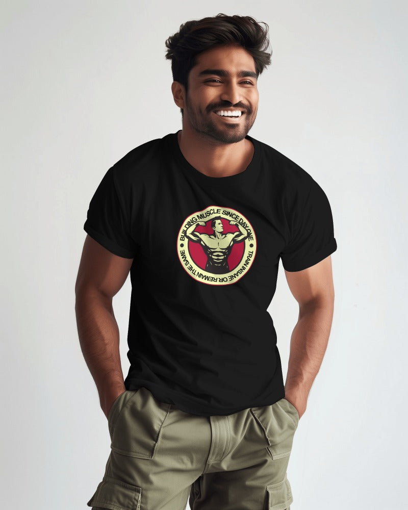 "Building Muscle Since Day One" Vintage Bodybuilding T-Shirt - Retro Fitness Badge Tee