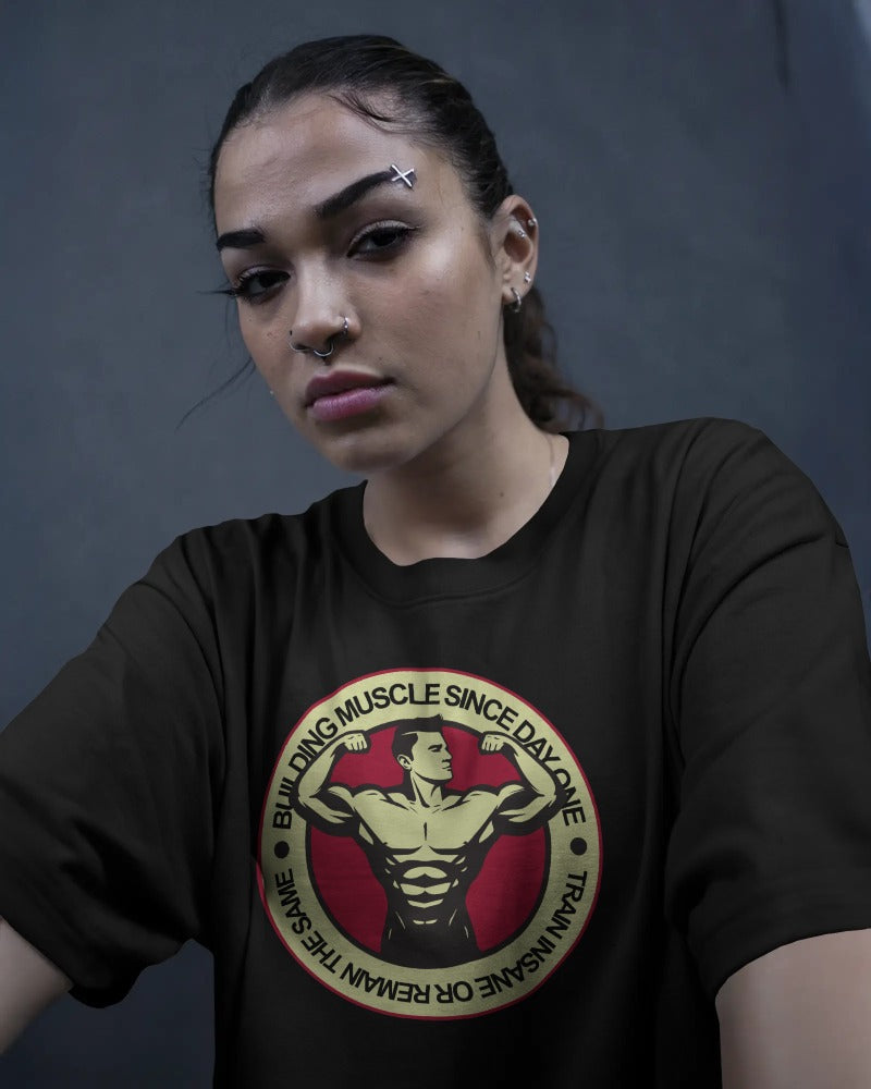 "Building Muscle Since Day One" Vintage Bodybuilding T-Shirt - Retro Fitness Badge Tee